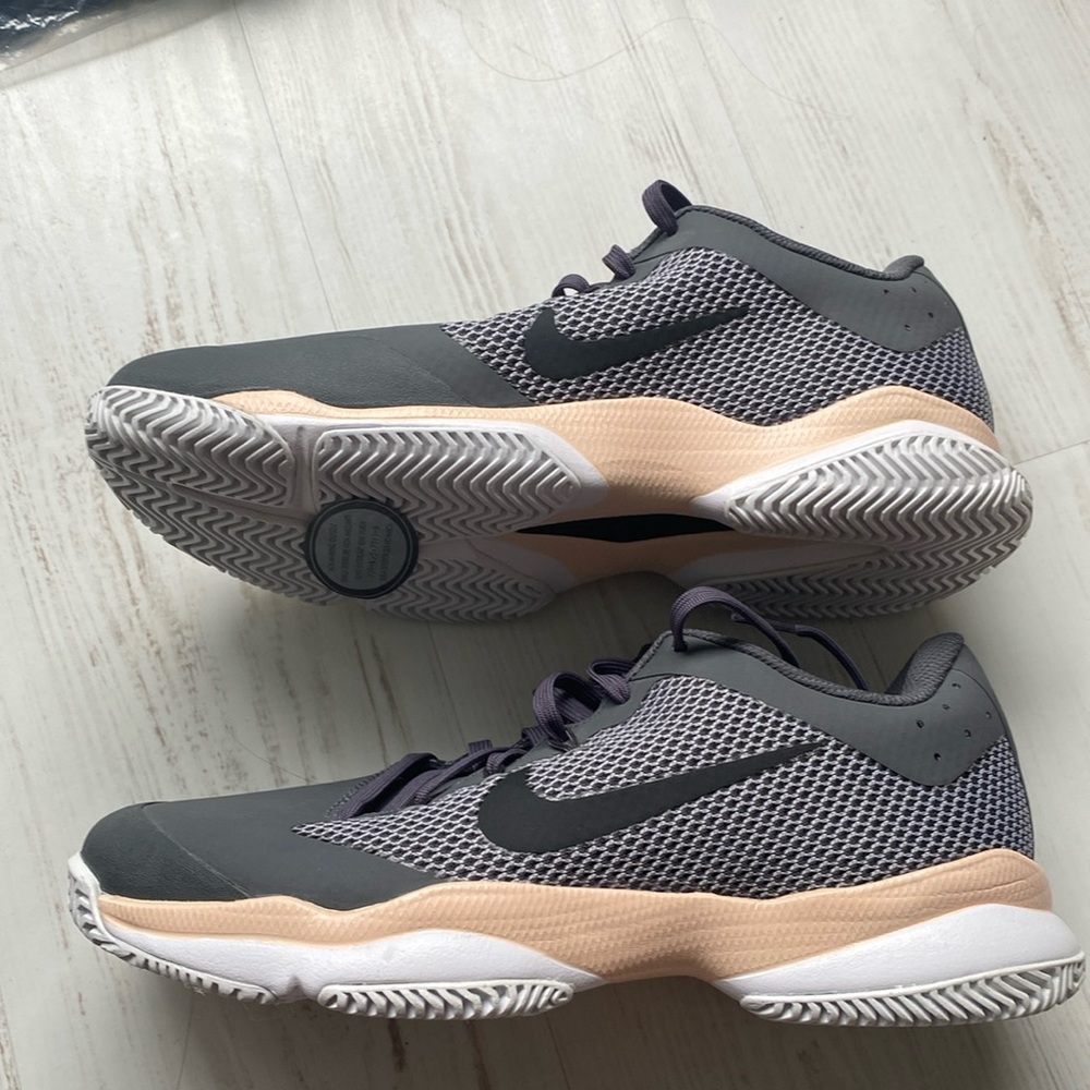 Nike gray and peach running shoes. Size 8